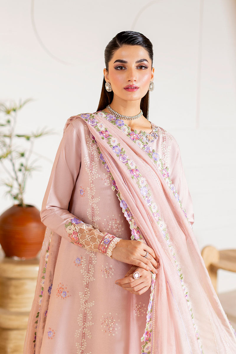 Model wearing blush pink embroidered Reyna outfit from Mushq, ideal for Pakistani luxury pret and Pakistani clothes online in UK.