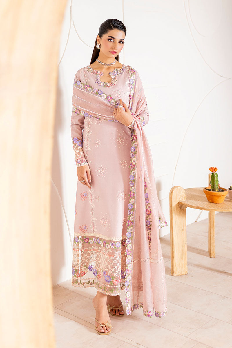 Model wearing blush pink embroidered Reyna outfit from Mushq, ideal for Pakistani luxury pret and Pakistani clothes online in UK.