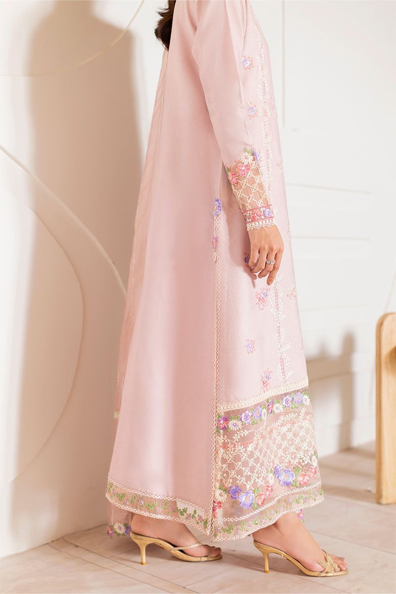 Model wearing blush pink embroidered Reyna outfit from Mushq, ideal for Pakistani luxury pret and Pakistani clothes online in UK.