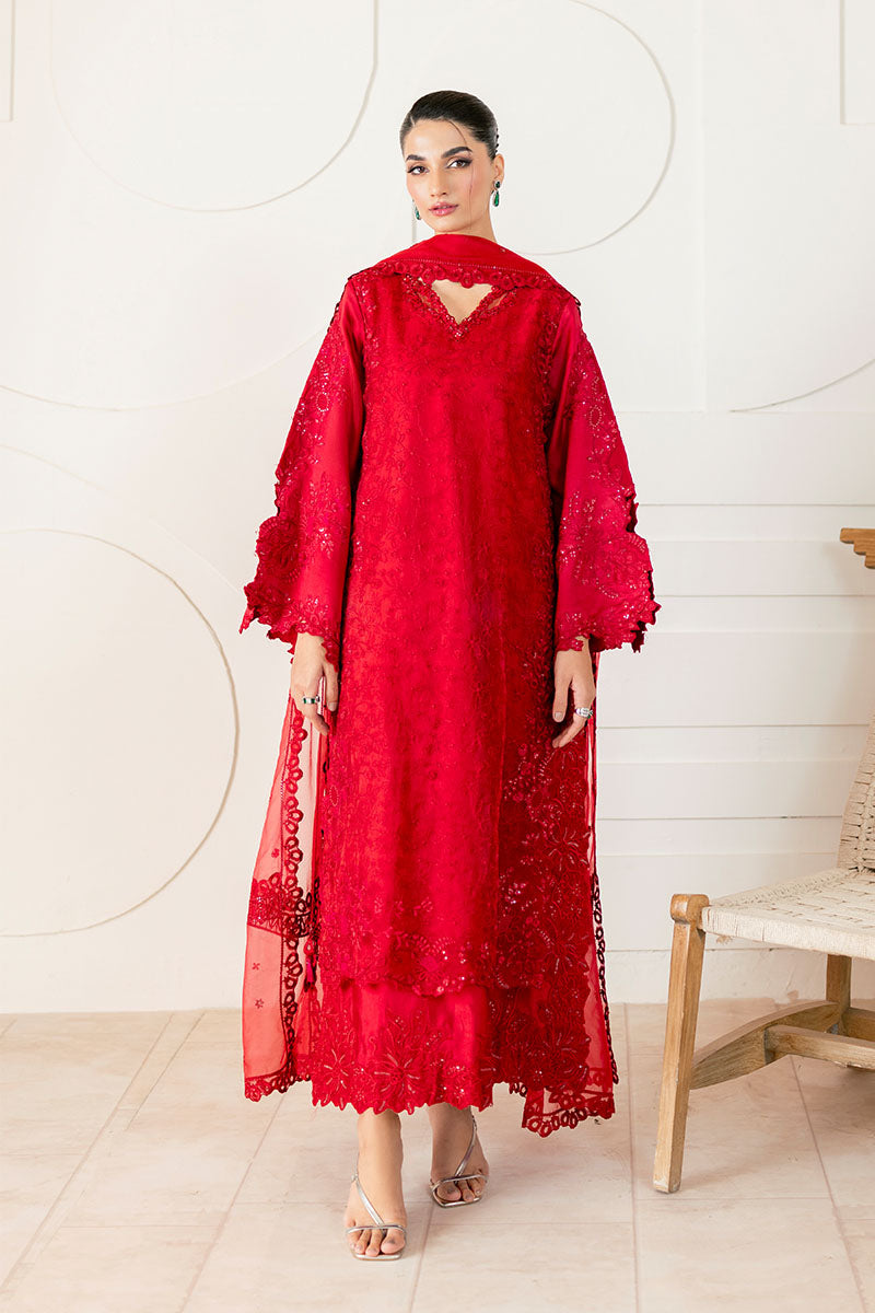 Model wearing deep red Rubea dress from Mushq, featuring intricate embroidery for Pakistani luxury pret and Pakistani clothes online in UK.