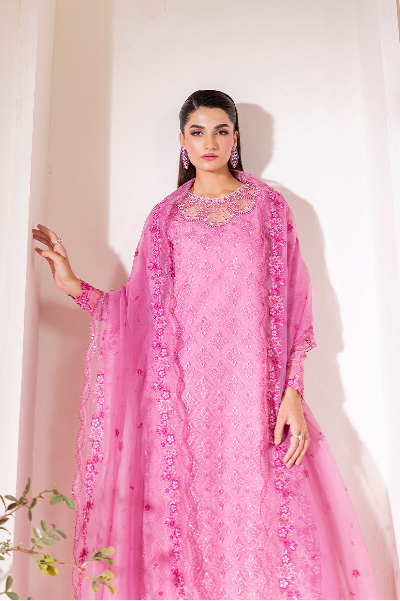 Model wearing blush pink embroidered Reyna outfit from Mushq, ideal for Pakistani luxury pret and Pakistani clothes online in UK.