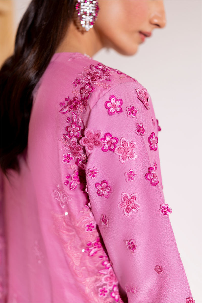 Model wearing blush pink embroidered Reyna outfit from Mushq, ideal for Pakistani luxury pret and Pakistani clothes online in UK.
