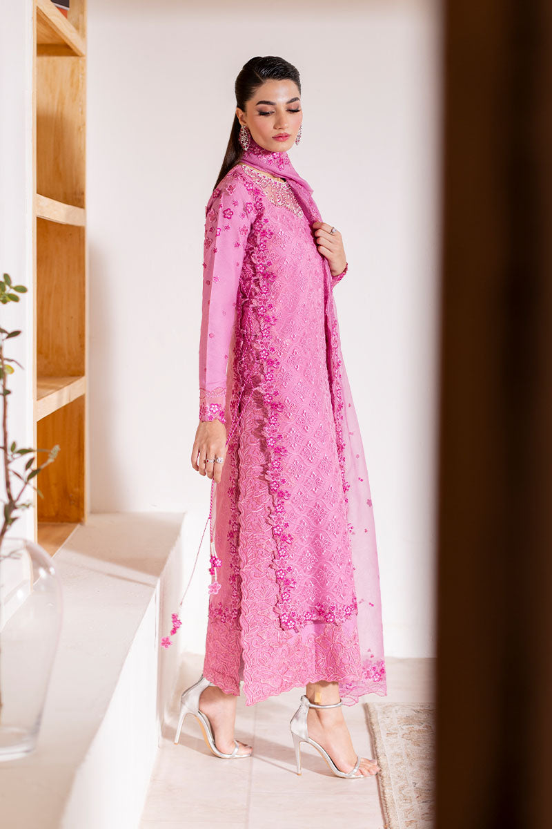 Model wearing blush pink embroidered Reyna outfit from Mushq, ideal for Pakistani luxury pret and Pakistani clothes online in UK.