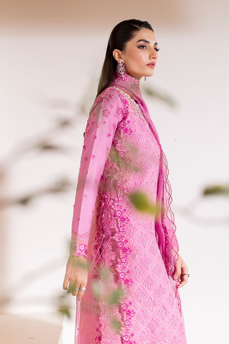 Model wearing blush pink embroidered Reyna outfit from Mushq, ideal for Pakistani luxury pret and Pakistani clothes online in UK.