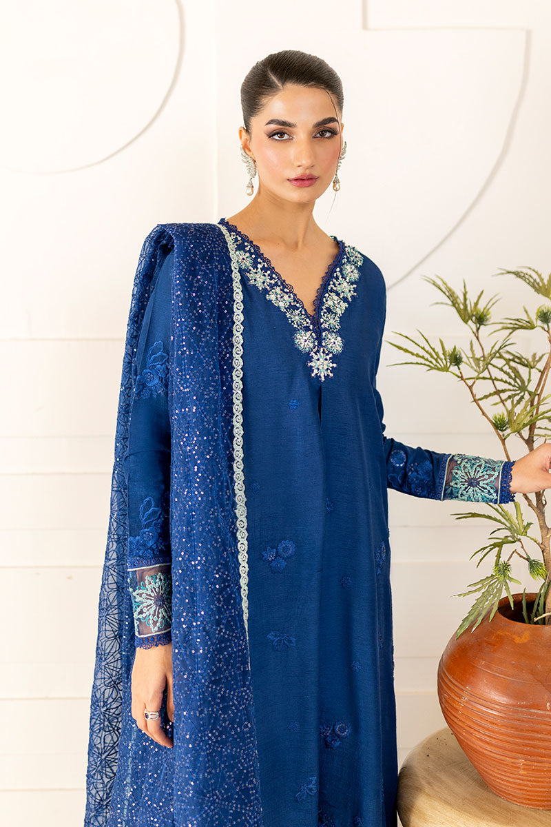 Model wearing deep navy blue embroidered Kayra dress from Mushq, ideal for Pakistani luxury pret and Pakistani clothes online in UK.