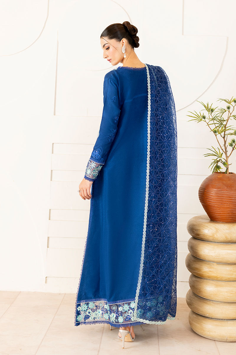 Model wearing deep navy blue embroidered Kayra dress from Mushq, ideal for Pakistani luxury pret and Pakistani clothes online in UK.
