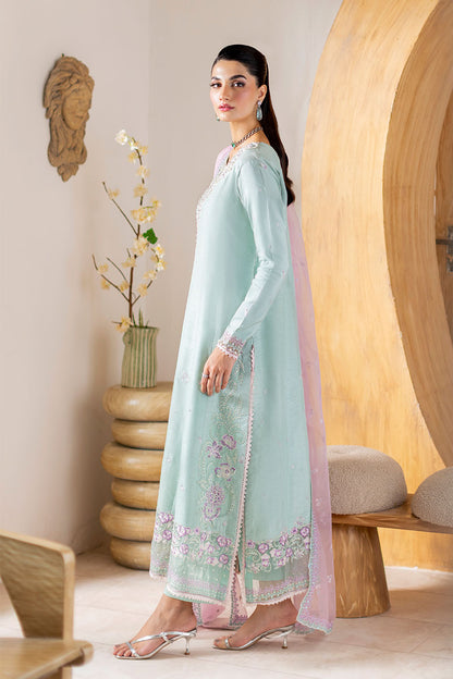 Model wearing mint green and lilac embroidered outfit Solstice from Mushq, showcasing Pakistani luxury pret and clothes online in UK.