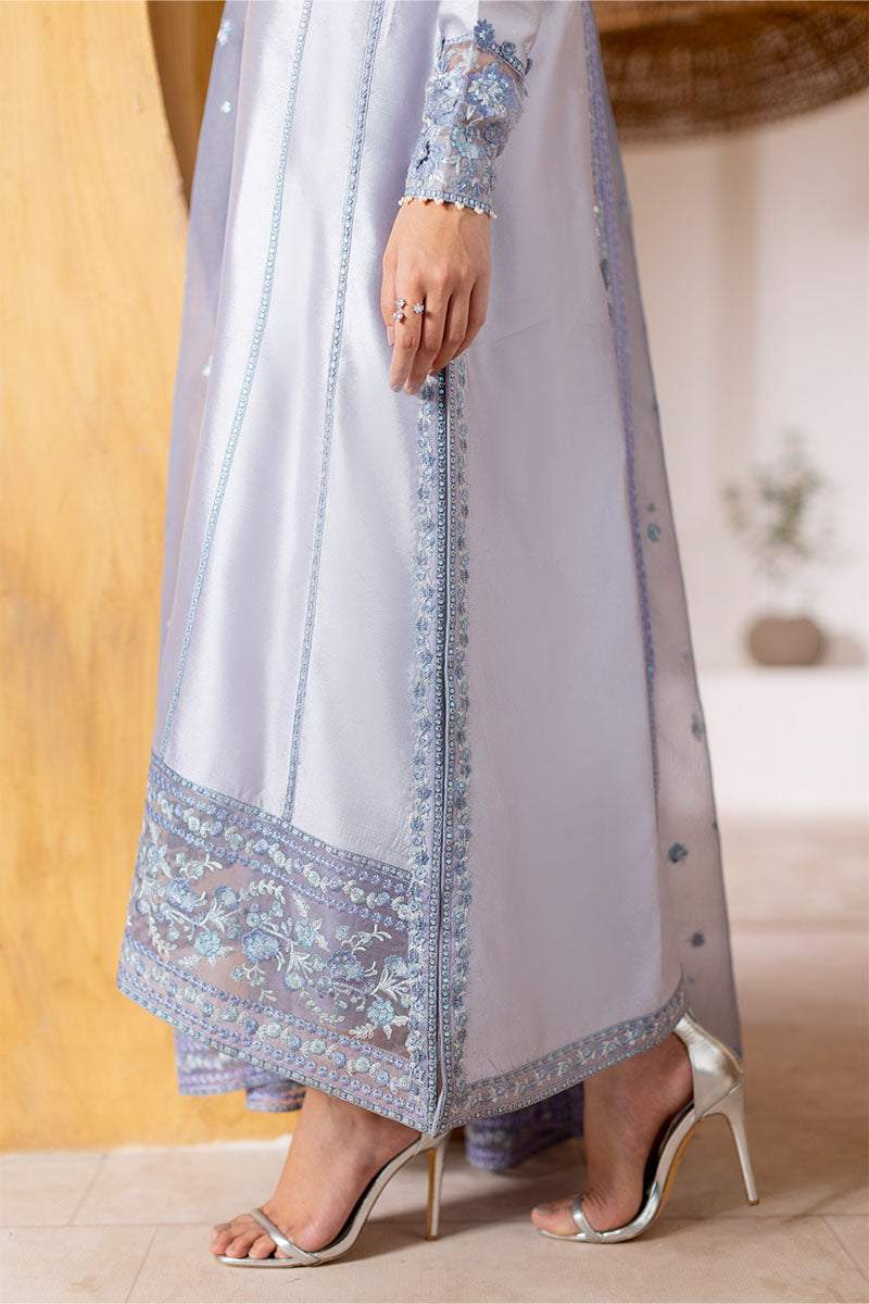 Model wearing lilac Elya dress from Mushq with hand-embellished details, perfect for Pakistani luxury pret and Pakistani clothes online in UK.