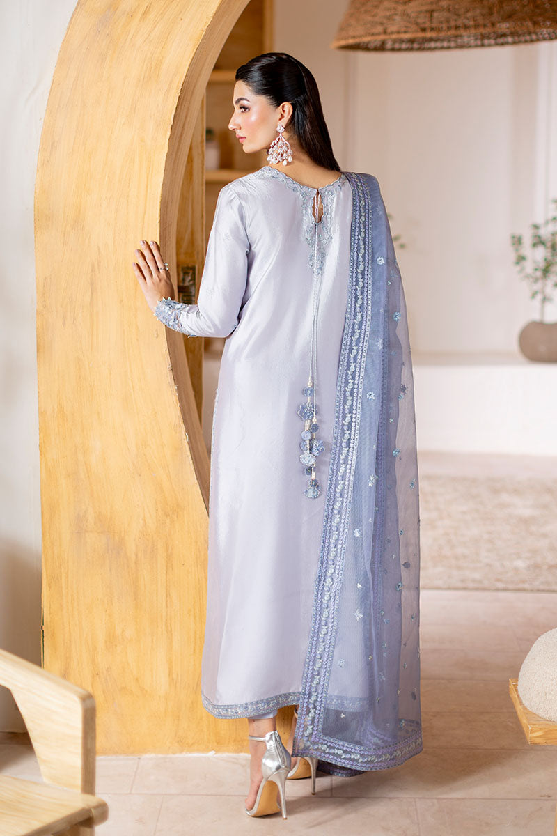 Model wearing lilac Elya dress from Mushq with hand-embellished details, perfect for Pakistani luxury pret and Pakistani clothes online in UK.