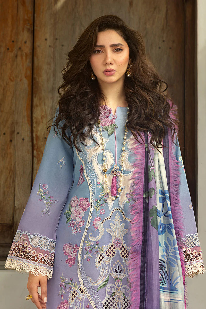 Model wearing lilac and aqua embroidered dress from Mushq Manaram Luxury Lawn '25 Whispering Melody, Pakistani luxury pret online in UK.