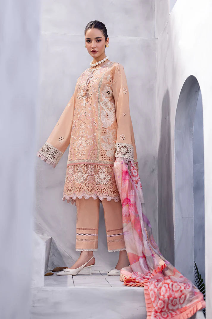 Model wearing peach embroidered dress with floral dupatta from Mushq Manaram Luxury Lawn '25 Dreamlike Vibe, Pakistani clothes online in UK.