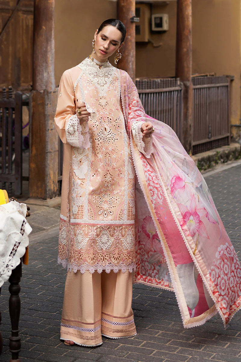 Model wearing peach embroidered dress with floral dupatta from Mushq Manaram Luxury Lawn '25 Dreamlike Vibe, Pakistani clothes online in UK.