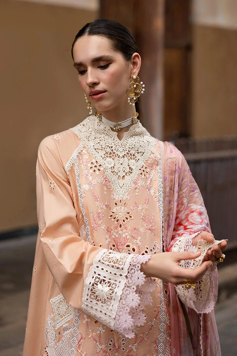 Model wearing peach embroidered dress with floral dupatta from Mushq Manaram Luxury Lawn '25 Dreamlike Vibe, Pakistani clothes online in UK.