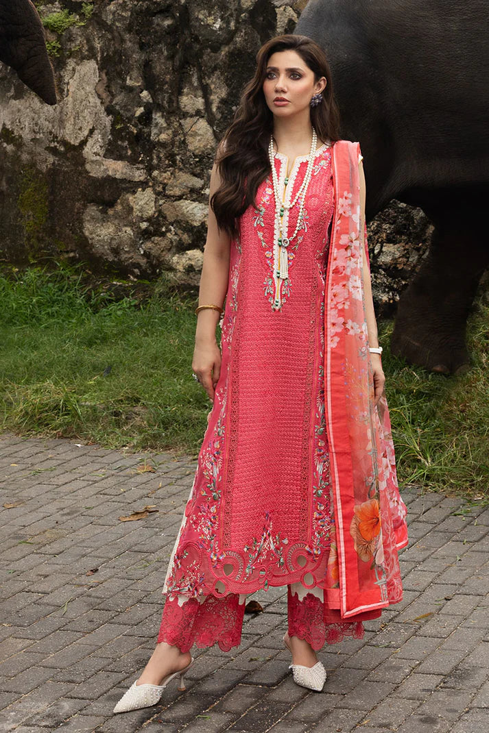 Model wearing coral red sleeveless embroidered dress with floral dupatta from Mushq Manaram Luxury Lawn '25 Eternal Radiance, Pakistani clothes online in UK.