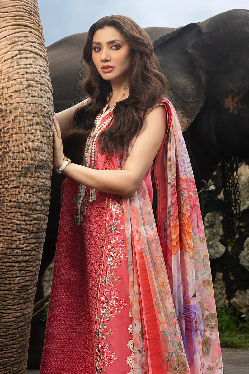 Model wearing coral red sleeveless embroidered dress with floral dupatta from Mushq Manaram Luxury Lawn '25 Eternal Radiance, Pakistani clothes online in UK.