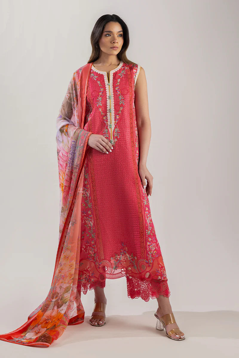 Model wearing coral red sleeveless embroidered dress with floral dupatta from Mushq Manaram Luxury Lawn '25 Eternal Radiance, Pakistani clothes online in UK.
