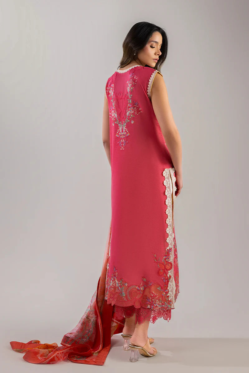Model wearing coral red sleeveless embroidered dress with floral dupatta from Mushq Manaram Luxury Lawn '25 Eternal Radiance, Pakistani clothes online in UK.