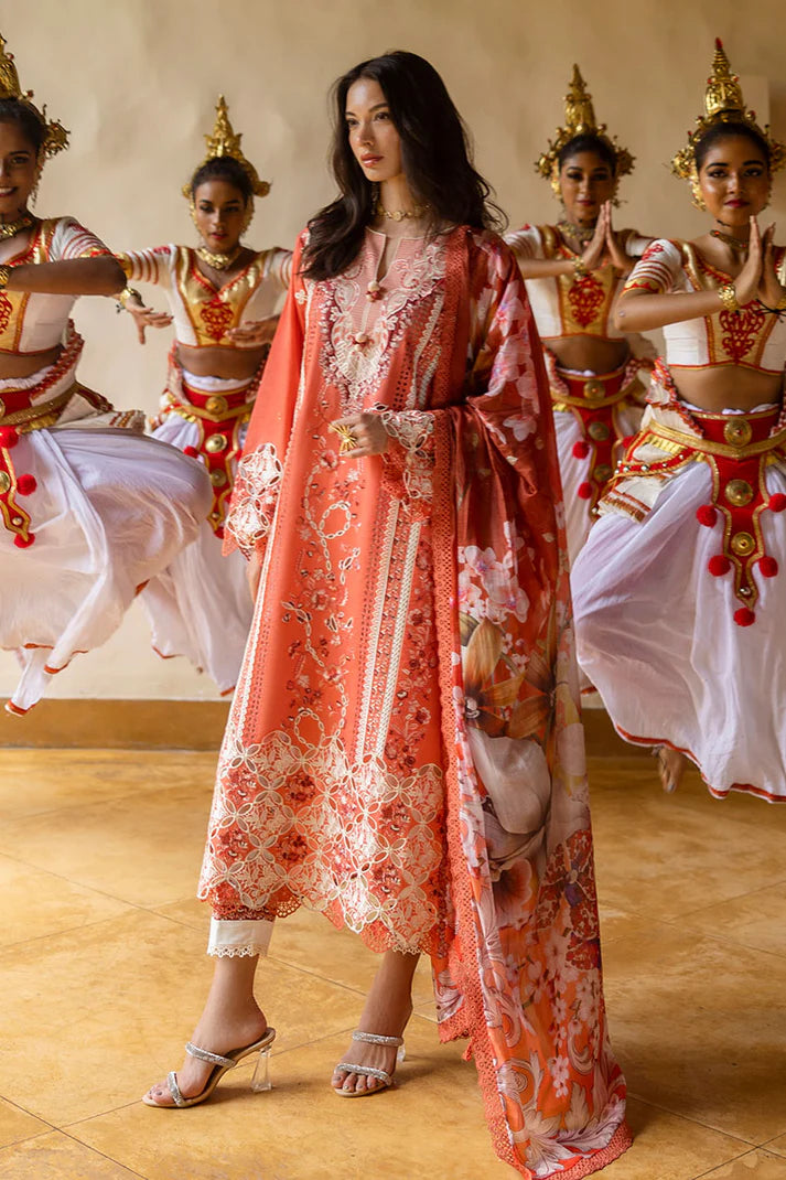 Model wearing burnt orange embroidered dress from Mushq Manaram Luxury Lawn '25 Starry Side, Pakistani luxury pret available online in UK.