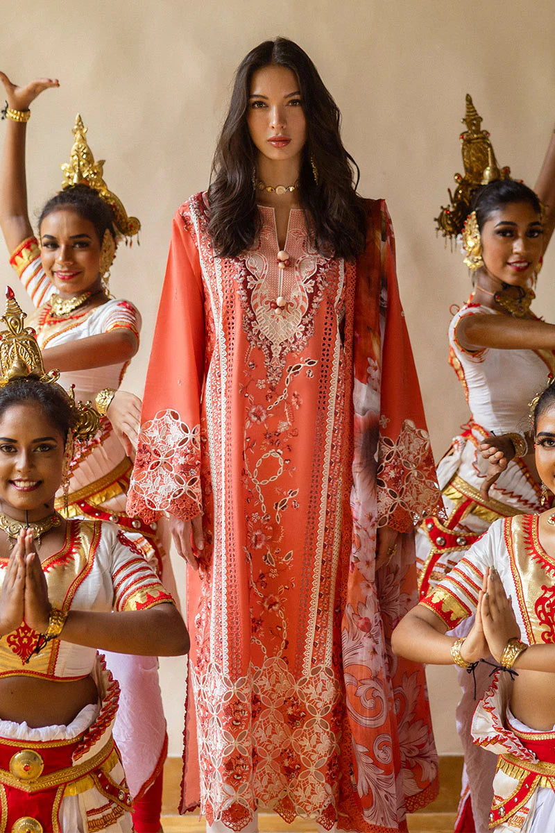 Model wearing burnt orange embroidered dress from Mushq Manaram Luxury Lawn '25 Starry Side, Pakistani luxury pret available online in UK.