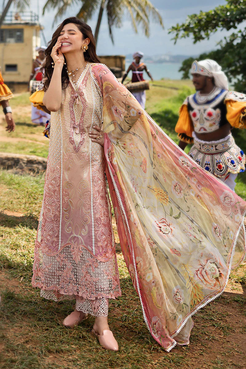 Model wearing sleeveless peach and pink embroidered dress from Mushq Manaram Luxury Lawn '25 Tranquil Spark, Pakistani clothes online in UK.