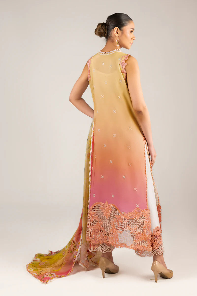 Model wearing sleeveless peach and pink embroidered dress from Mushq Manaram Luxury Lawn '25 Tranquil Spark, Pakistani clothes online in UK.