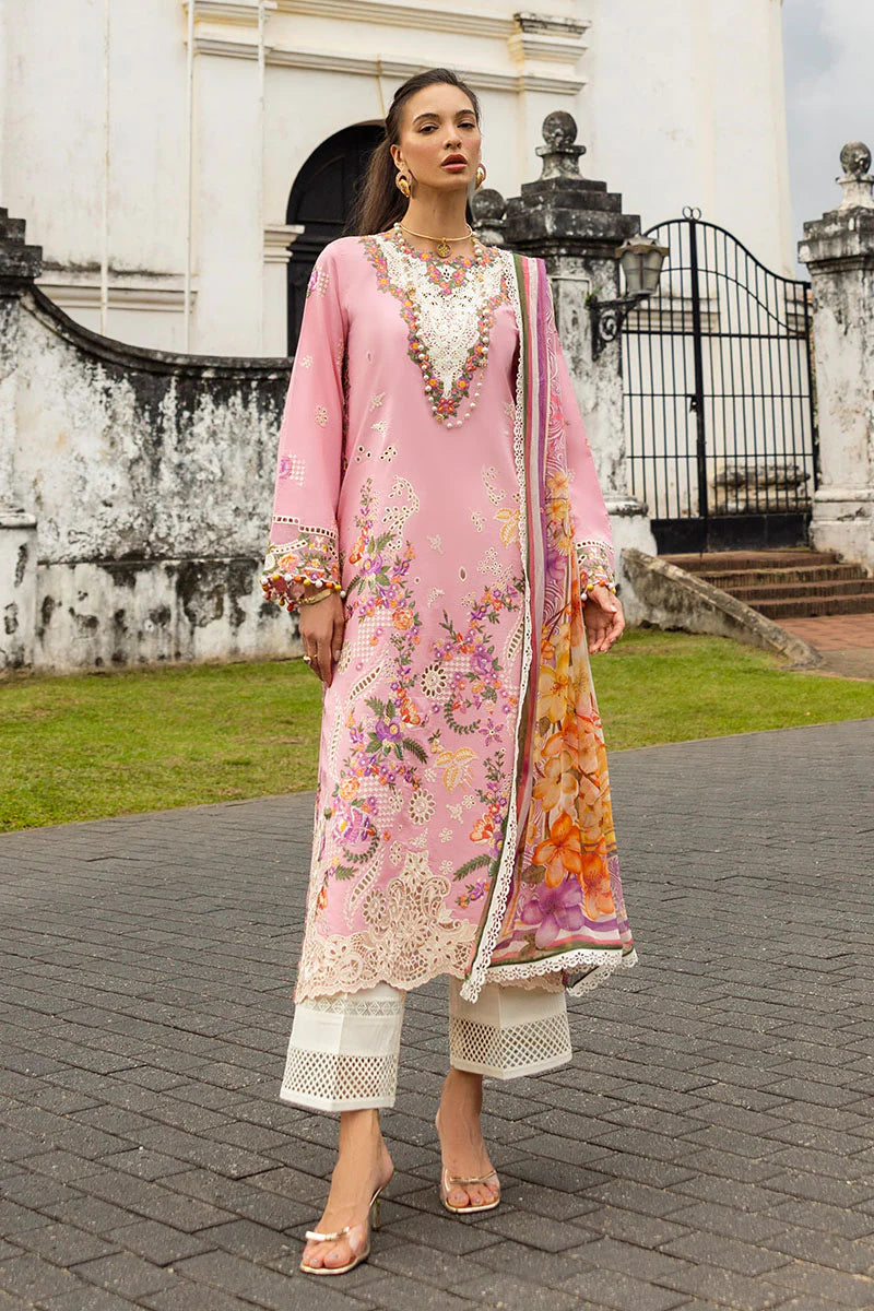 Model wearing blush pink embroidered dress with floral detailing and lace border from Mushq Manaram Luxury Lawn '25 Twinkling Tempos, Pakistani clothes online in UK.