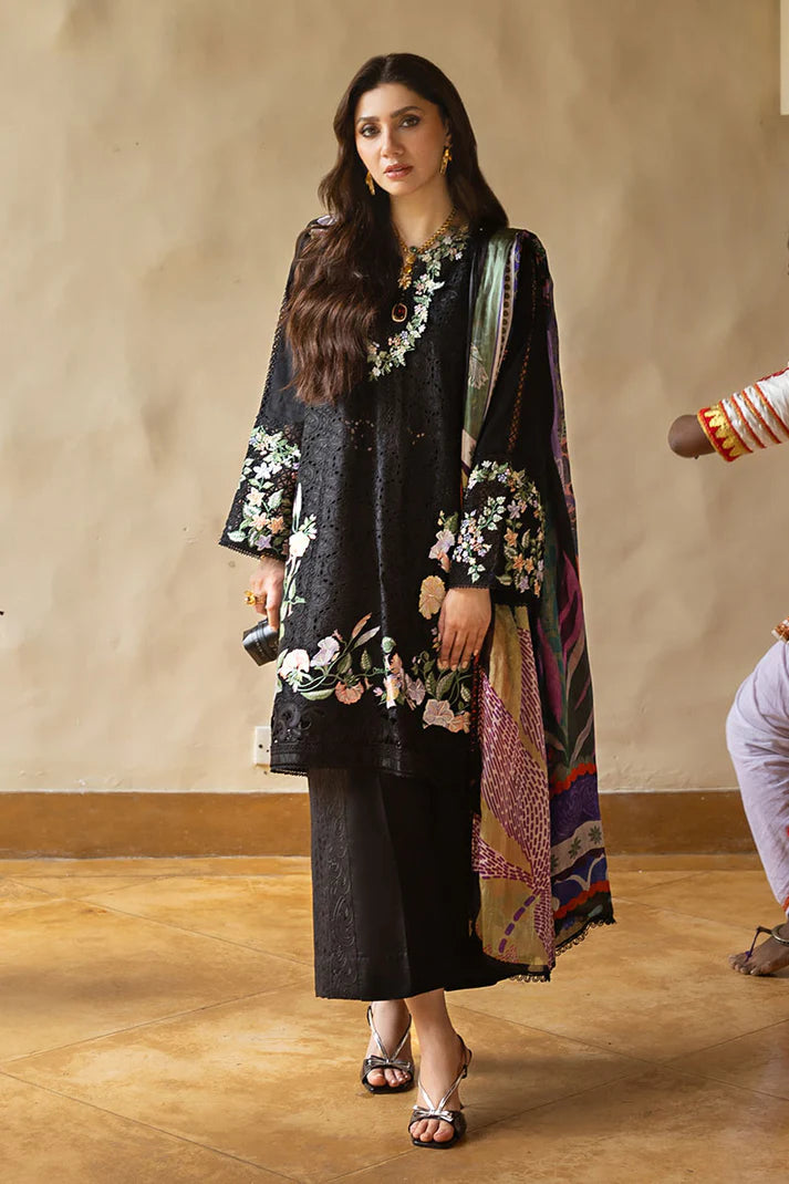 Model wearing black embroidered floral shirt with matching trousers and multicolour dupatta from Mushq Manaram Luxury Lawn 2025 Dazzling Glimmer. Pakistani clothes online UK.