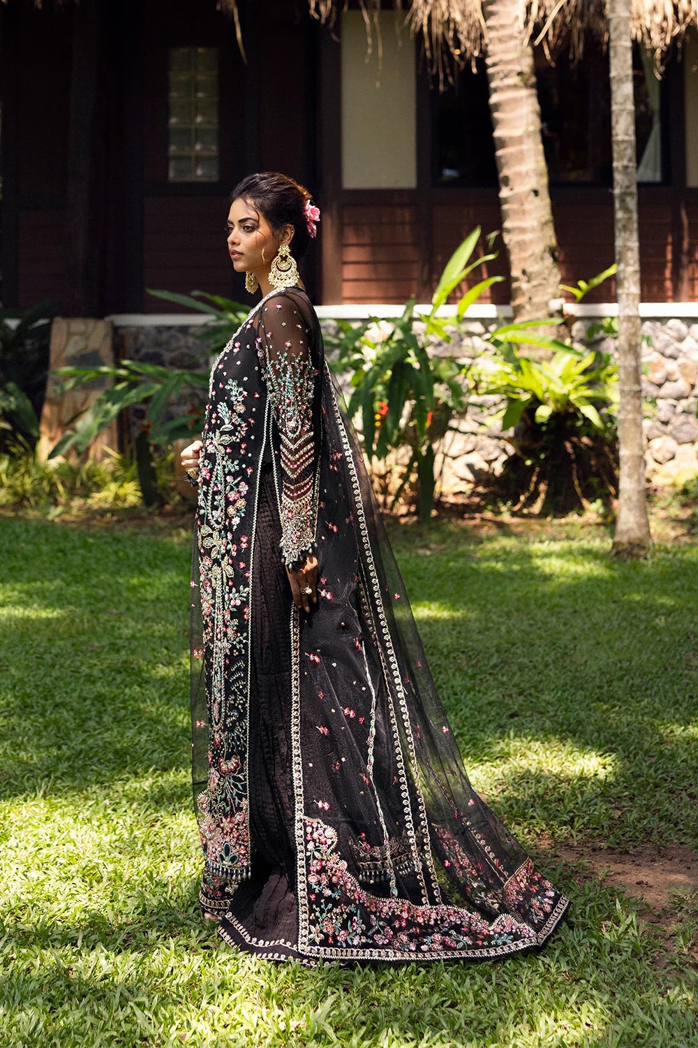 Model wearing Saira Rizwan AVINA-SRF25-02 in black with pastel floral embroidery – Pakistani luxury pret, shop online in UK.