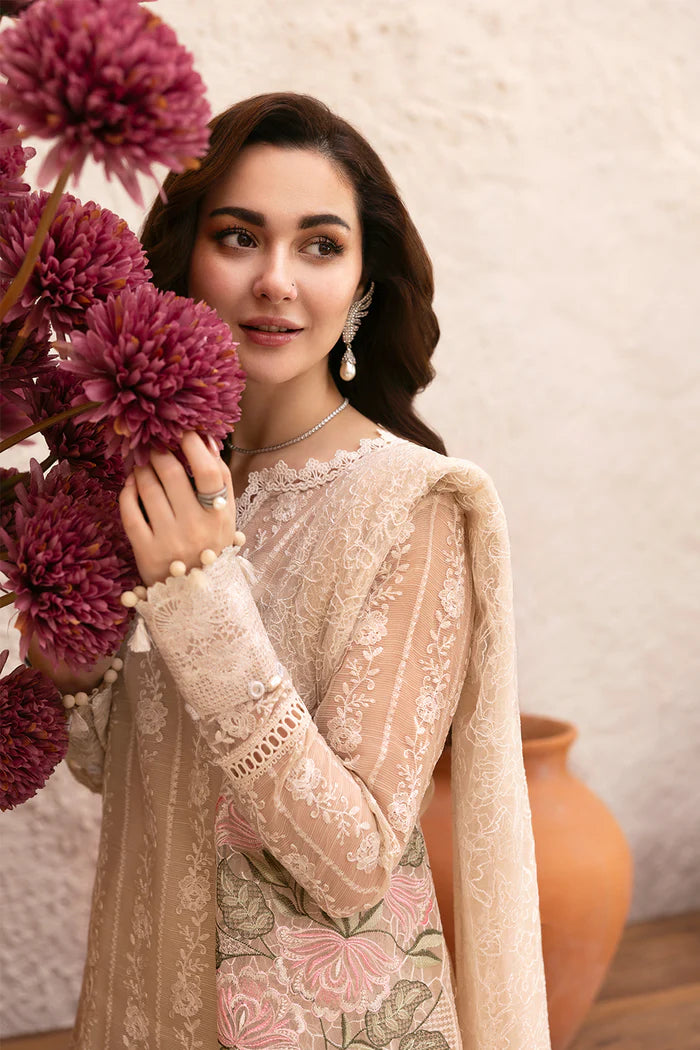 Model wearing beige embroidered shirt with lace detailing and matching floral dupatta from Saira Rizwan, Pakistani luxury pret, Pakistani clothes online in UK.