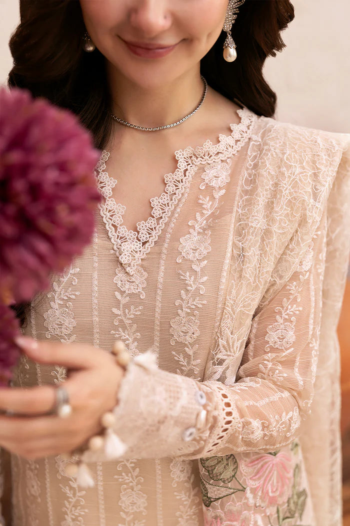 Model wearing beige embroidered shirt with lace detailing and matching floral dupatta from Saira Rizwan, Pakistani luxury pret, Pakistani clothes online in UK.