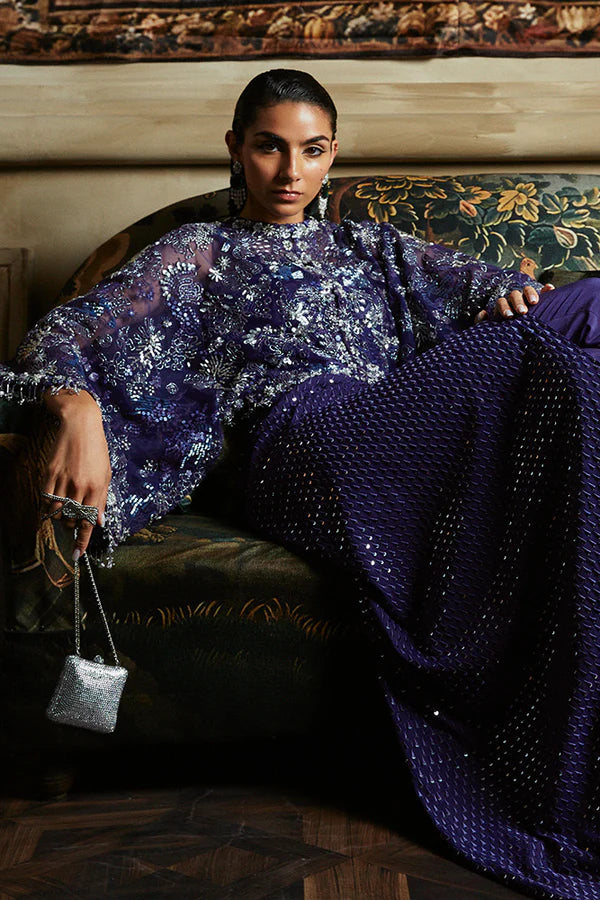 Model wearing Suffuse's MAEVE dress, a stunning addition to the Luxury Pret '24 collection. Shop Pakistani clothes online in UK.