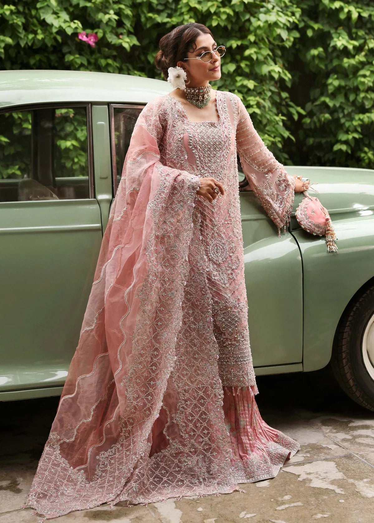 Model wearing Huriya by Kanwal Malik in black heavily embroidered outfit – Pakistani luxury pret available online in UK for festive wear.