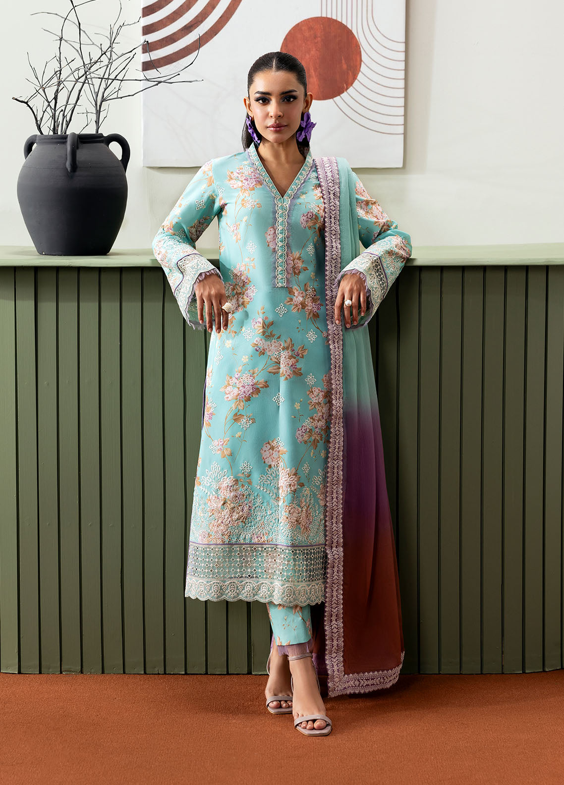 Model wearing aqua blue floral outfit from Gulaal Basics | Celia, premium Pakistani luxury pret available online in UK.