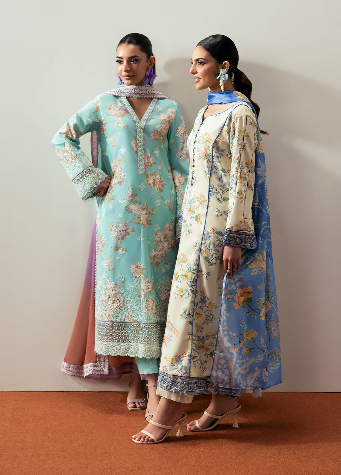 Model wearing aqua blue floral outfit from Gulaal Basics | Celia, premium Pakistani luxury pret available online in UK.