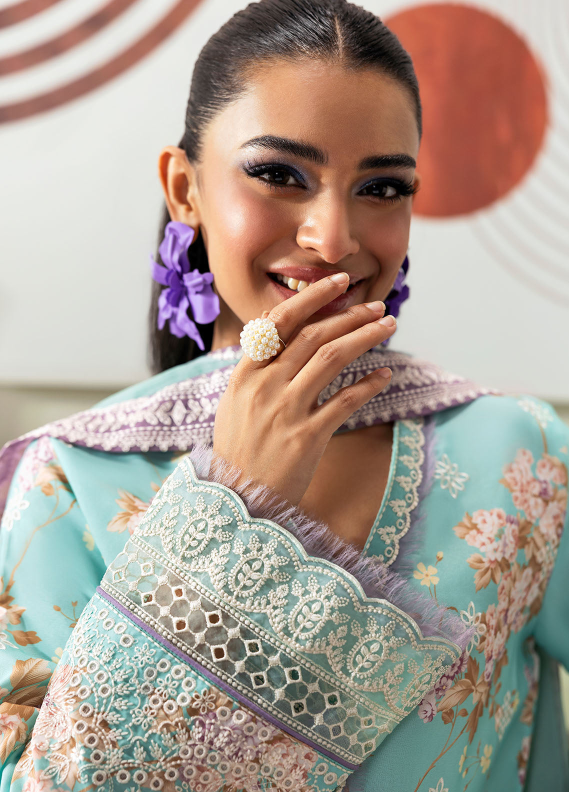 Model wearing aqua blue floral outfit from Gulaal Basics | Celia, premium Pakistani luxury pret available online in UK.