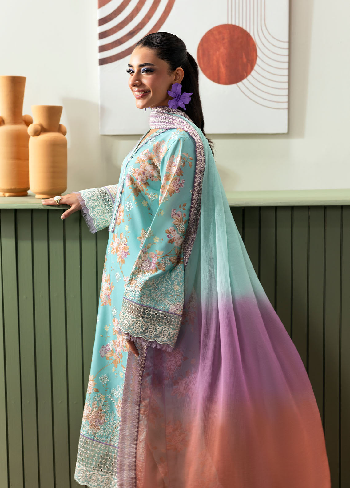 Model wearing aqua blue floral outfit from Gulaal Basics | Celia, premium Pakistani luxury pret available online in UK.