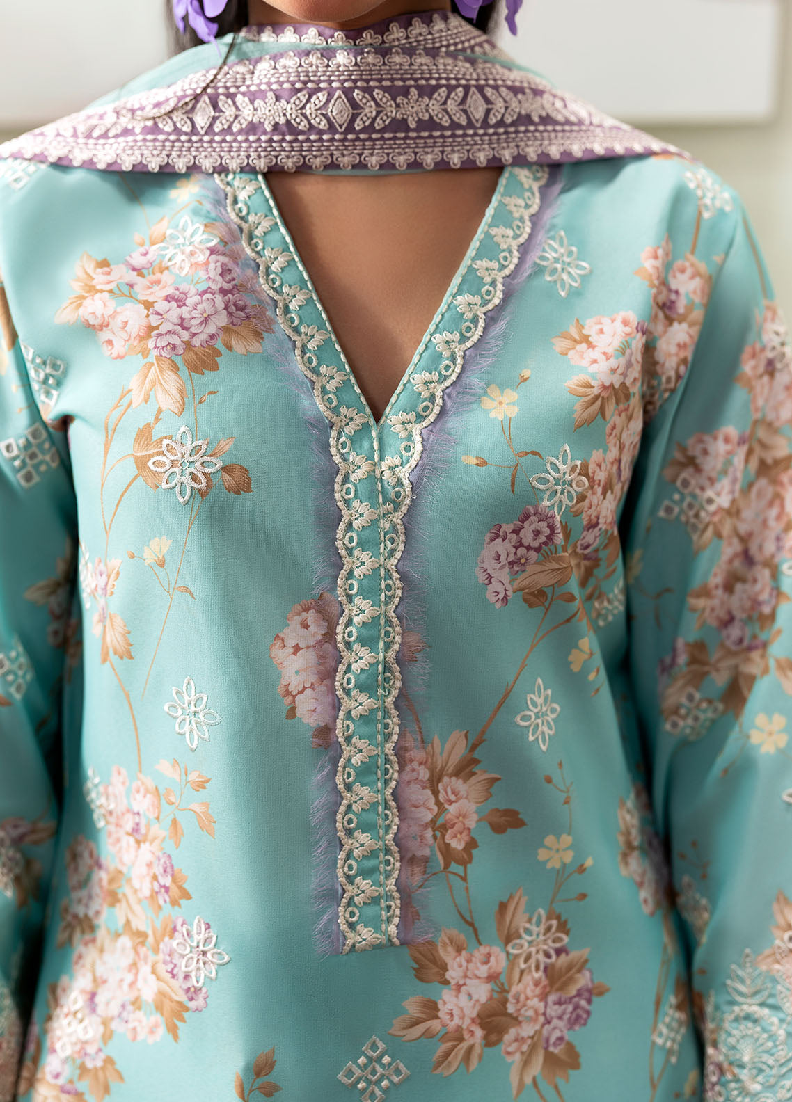 Model wearing aqua blue floral outfit from Gulaal Basics | Celia, premium Pakistani luxury pret available online in UK.