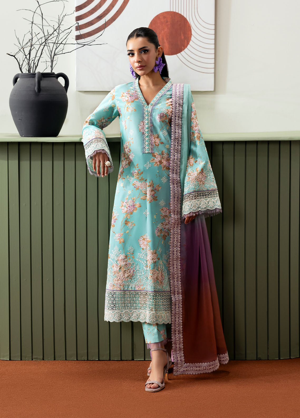 Model wearing aqua blue floral outfit from Gulaal Basics | Celia, premium Pakistani luxury pret available online in UK.