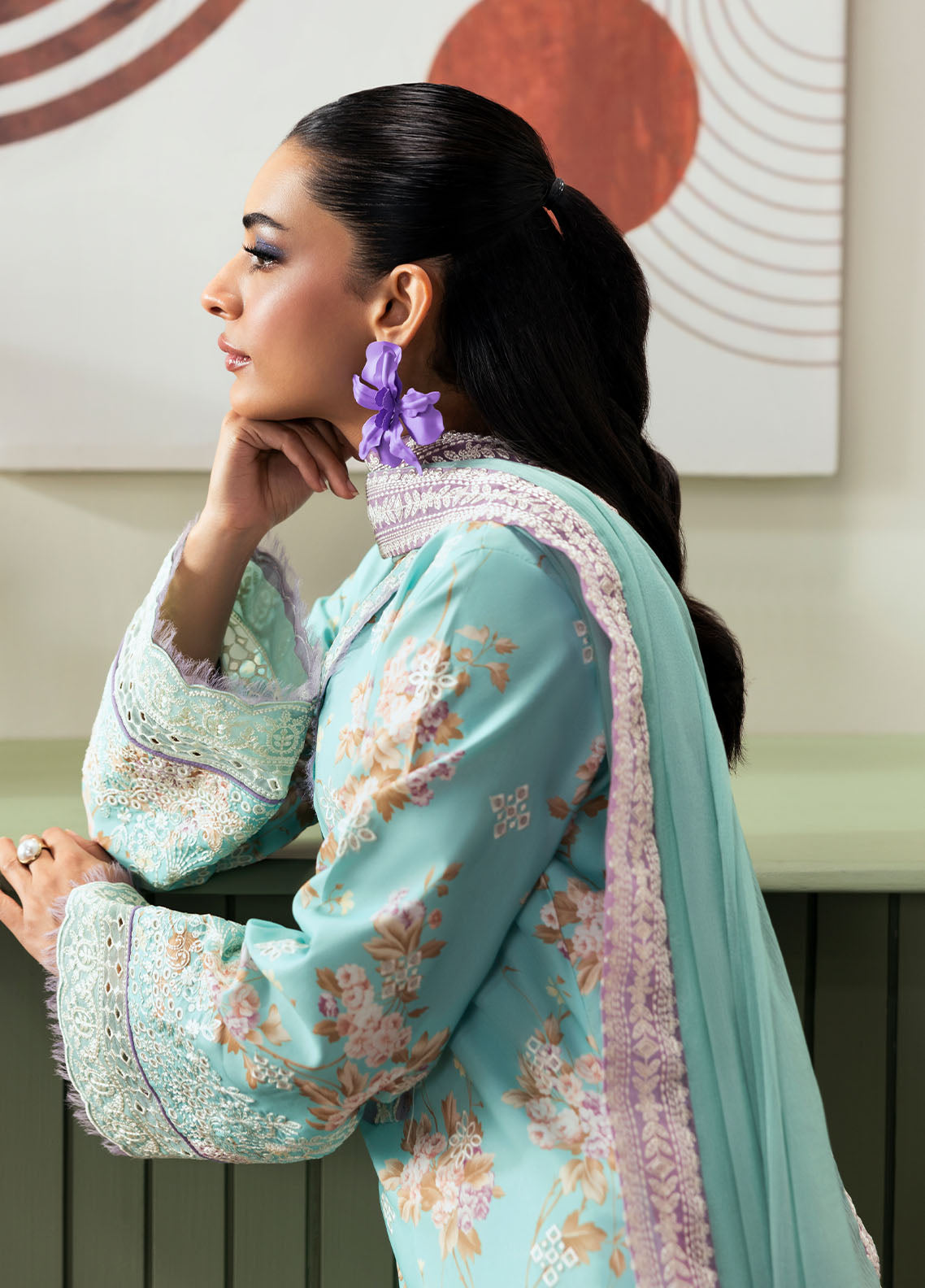 Model wearing aqua blue floral outfit from Gulaal Basics | Celia, premium Pakistani luxury pret available online in UK.