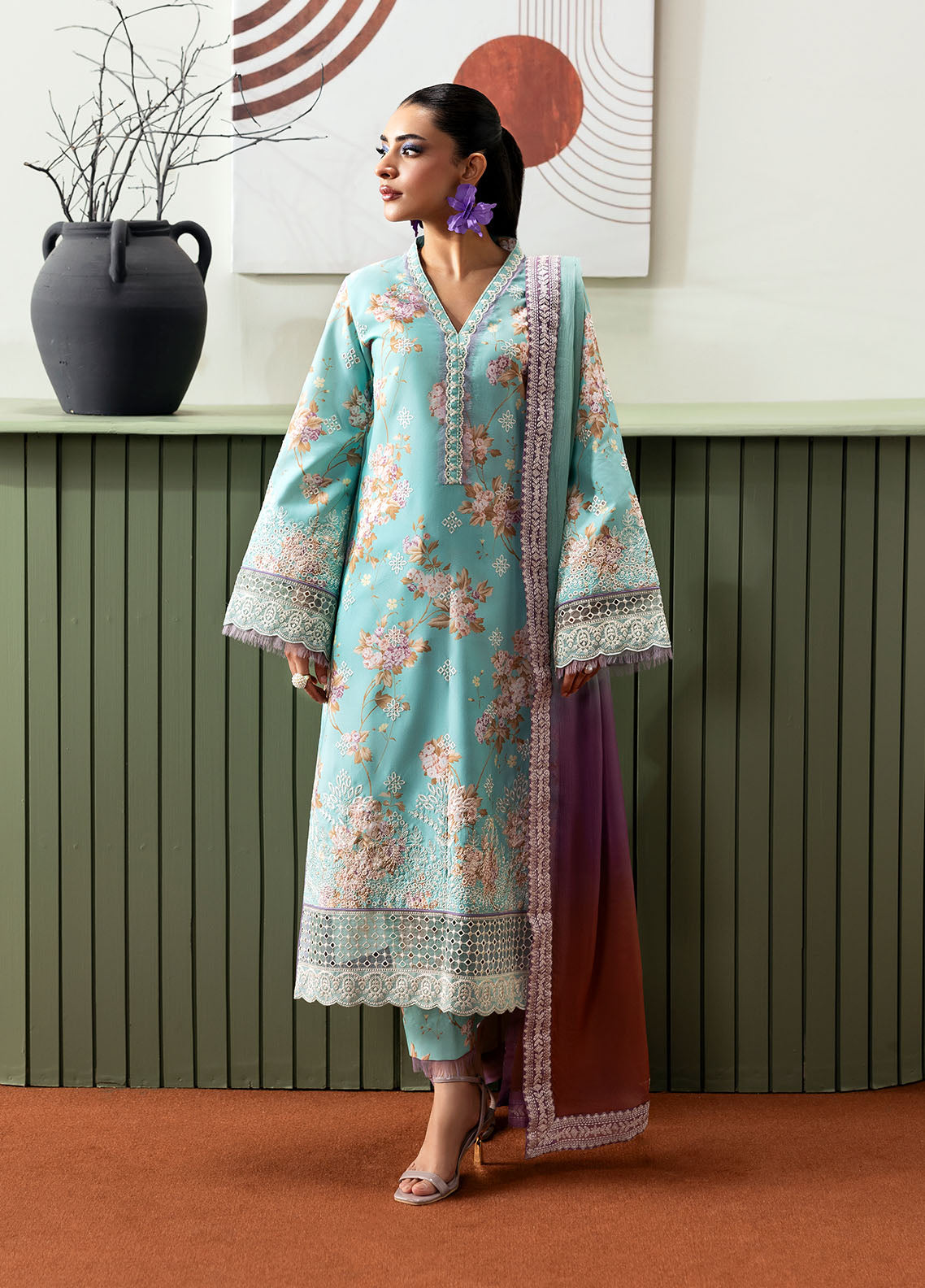 Model wearing aqua blue floral outfit from Gulaal Basics | Celia, premium Pakistani luxury pret available online in UK.