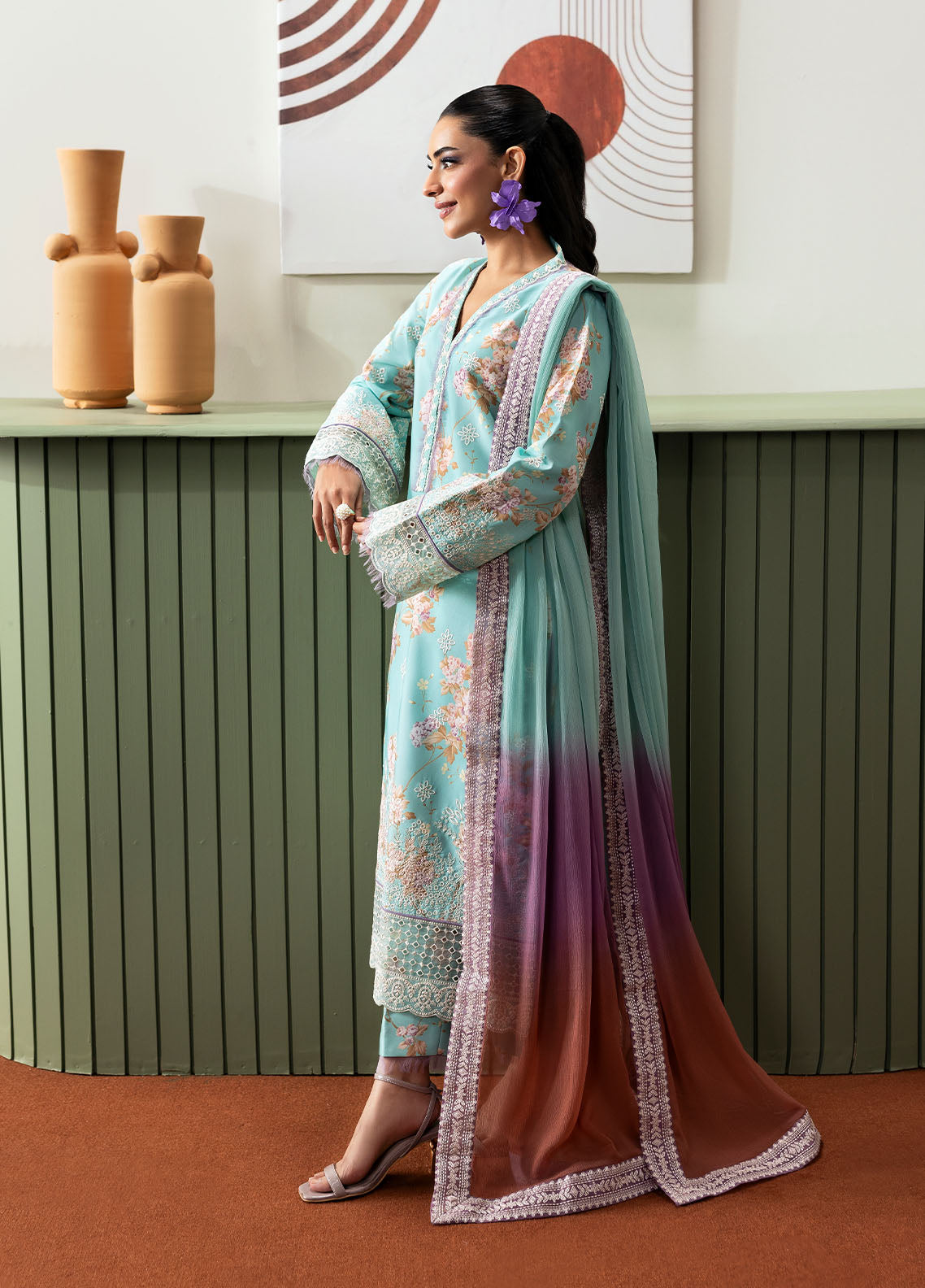 Model wearing aqua blue floral outfit from Gulaal Basics | Celia, premium Pakistani luxury pret available online in UK.