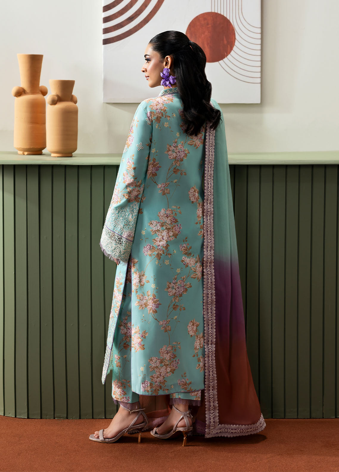 Model wearing aqua blue floral outfit from Gulaal Basics | Celia, premium Pakistani luxury pret available online in UK.