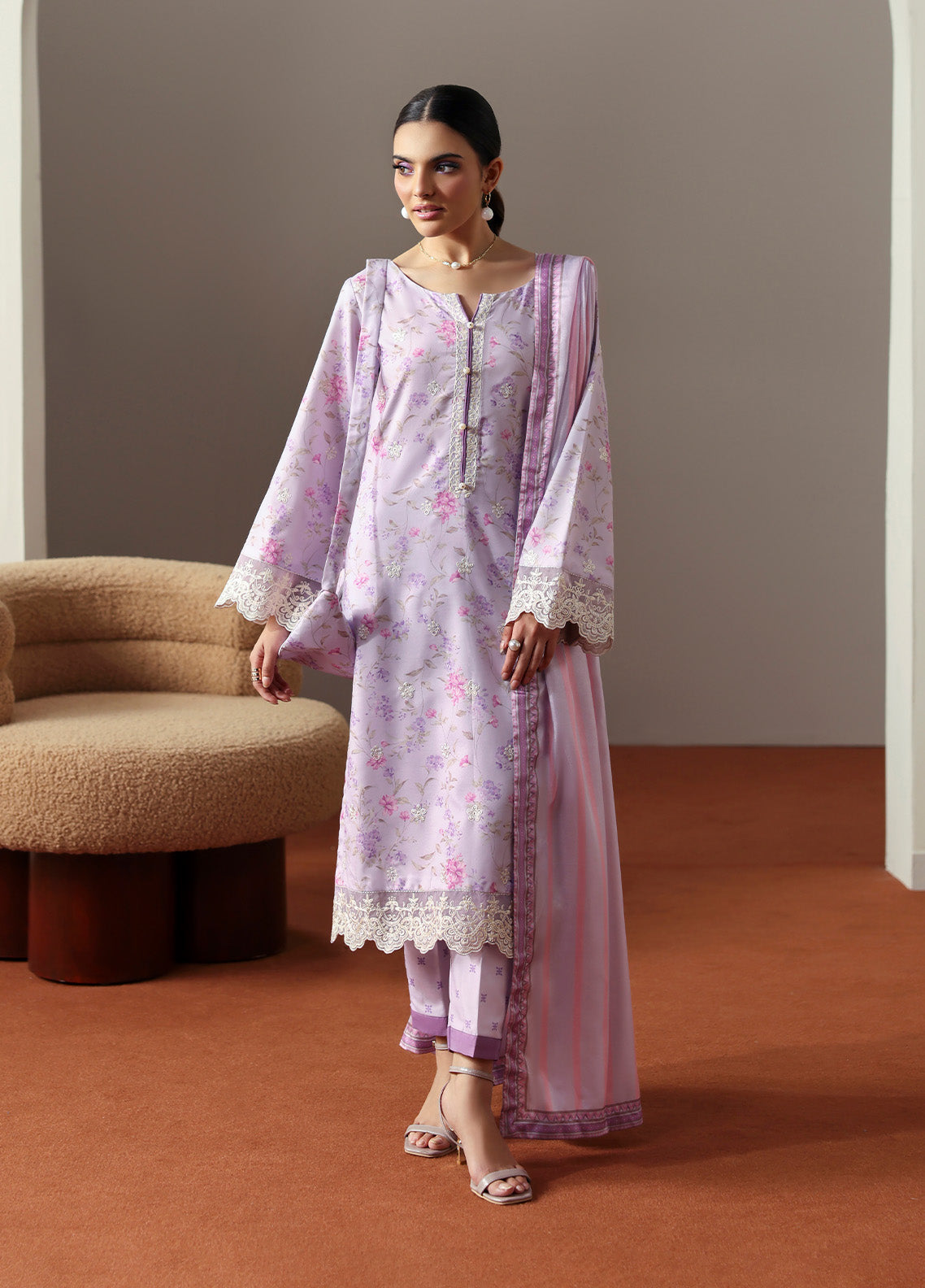 Model wearing Quince from Gulaal in a soft lavender printed co-ord set with lace detailing and striped dupatta, perfect for Pakistani luxury pret in the UK.