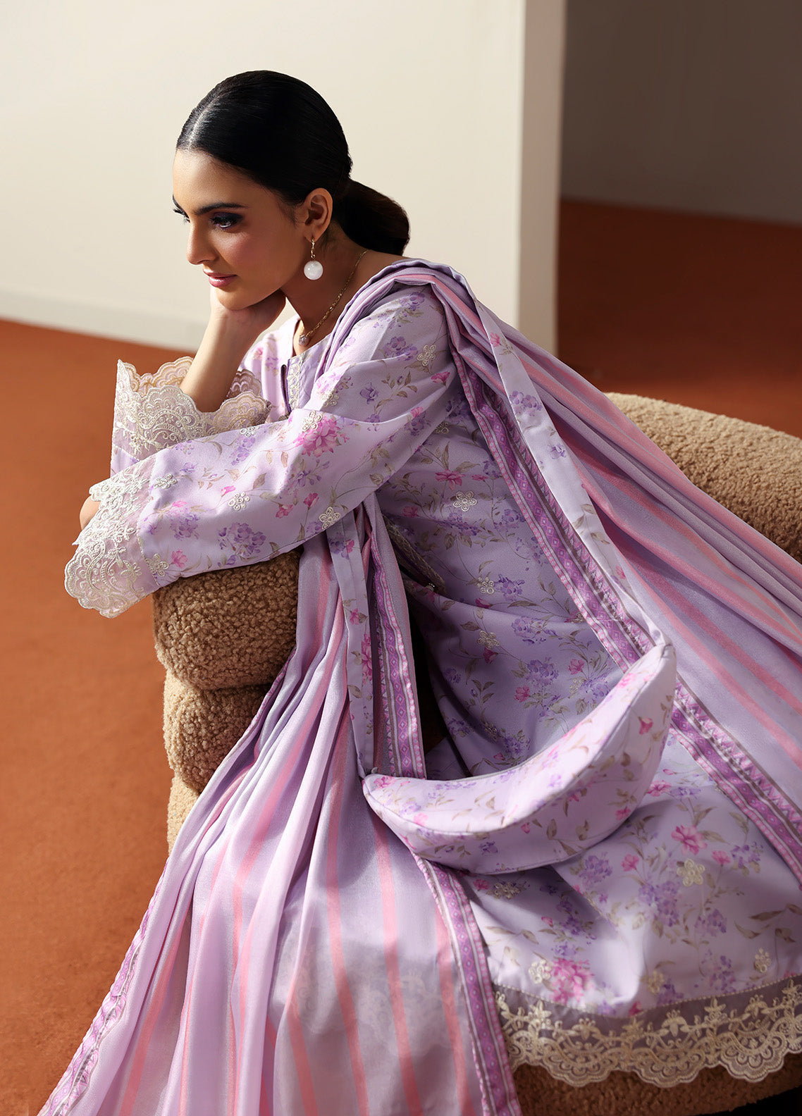 Model wearing Quince from Gulaal in a soft lavender printed co-ord set with lace detailing and striped dupatta, perfect for Pakistani luxury pret in the UK.