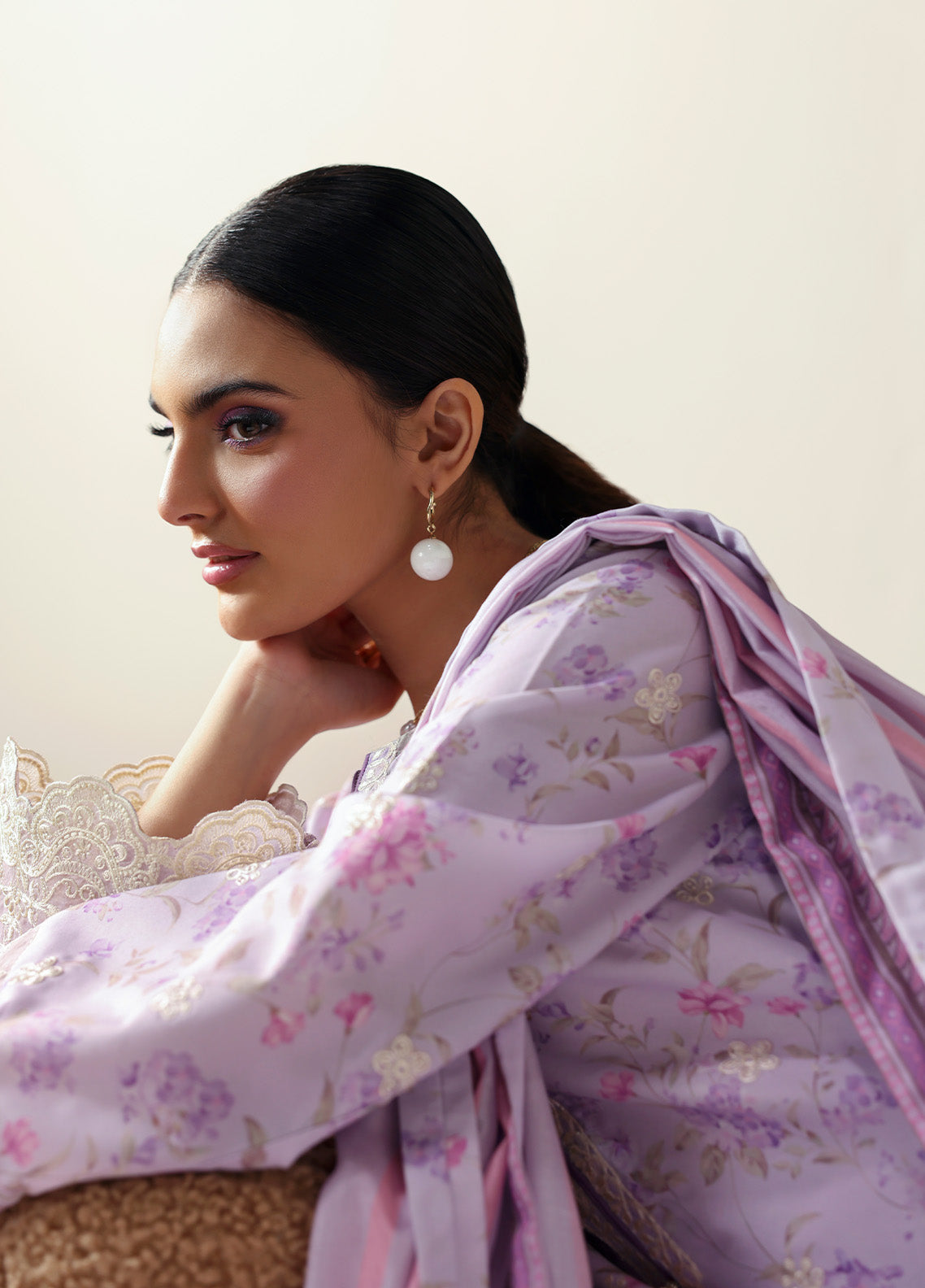 Model wearing Quince from Gulaal in a soft lavender printed co-ord set with lace detailing and striped dupatta, perfect for Pakistani luxury pret in the UK.