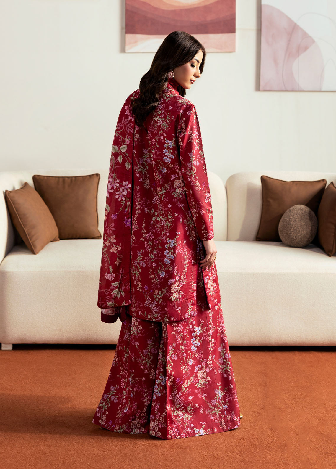 Model wearing deep red floral printed outfit from Gulaal Basics | Aster, perfect Pakistani luxury pret for Pakistani clothes online in UK.