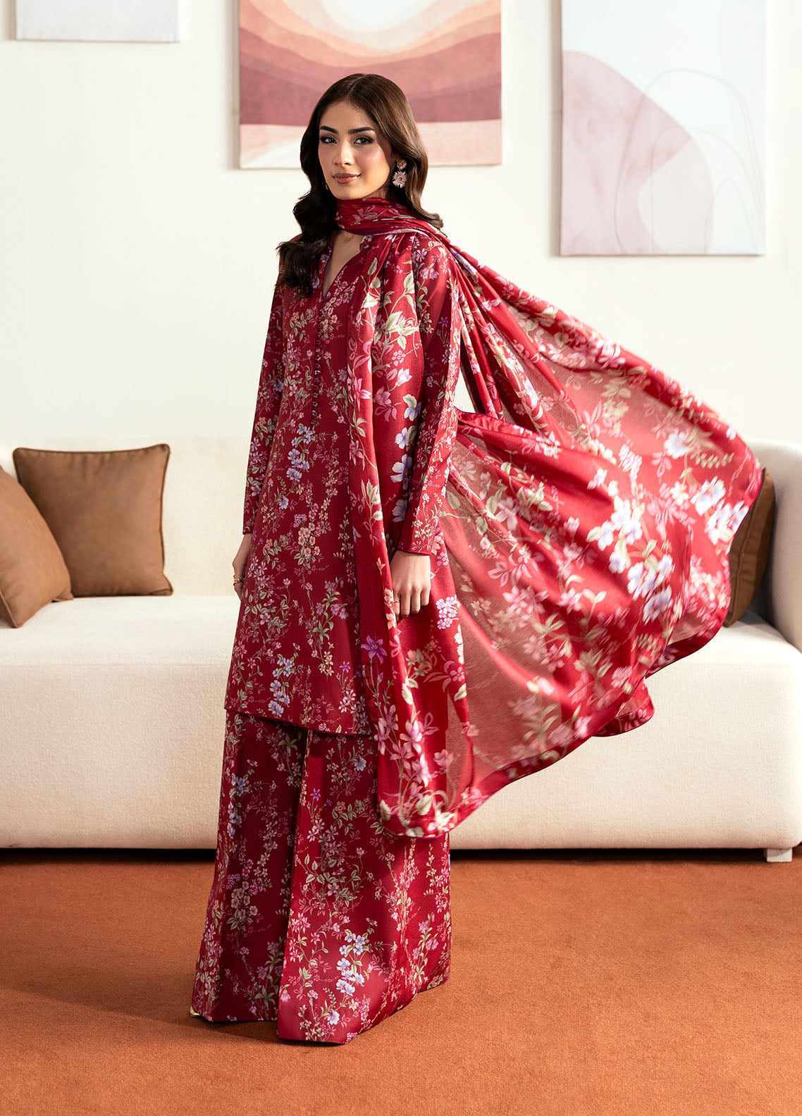 Model wearing deep red floral printed outfit from Gulaal Basics | Aster, perfect Pakistani luxury pret for Pakistani clothes online in UK.