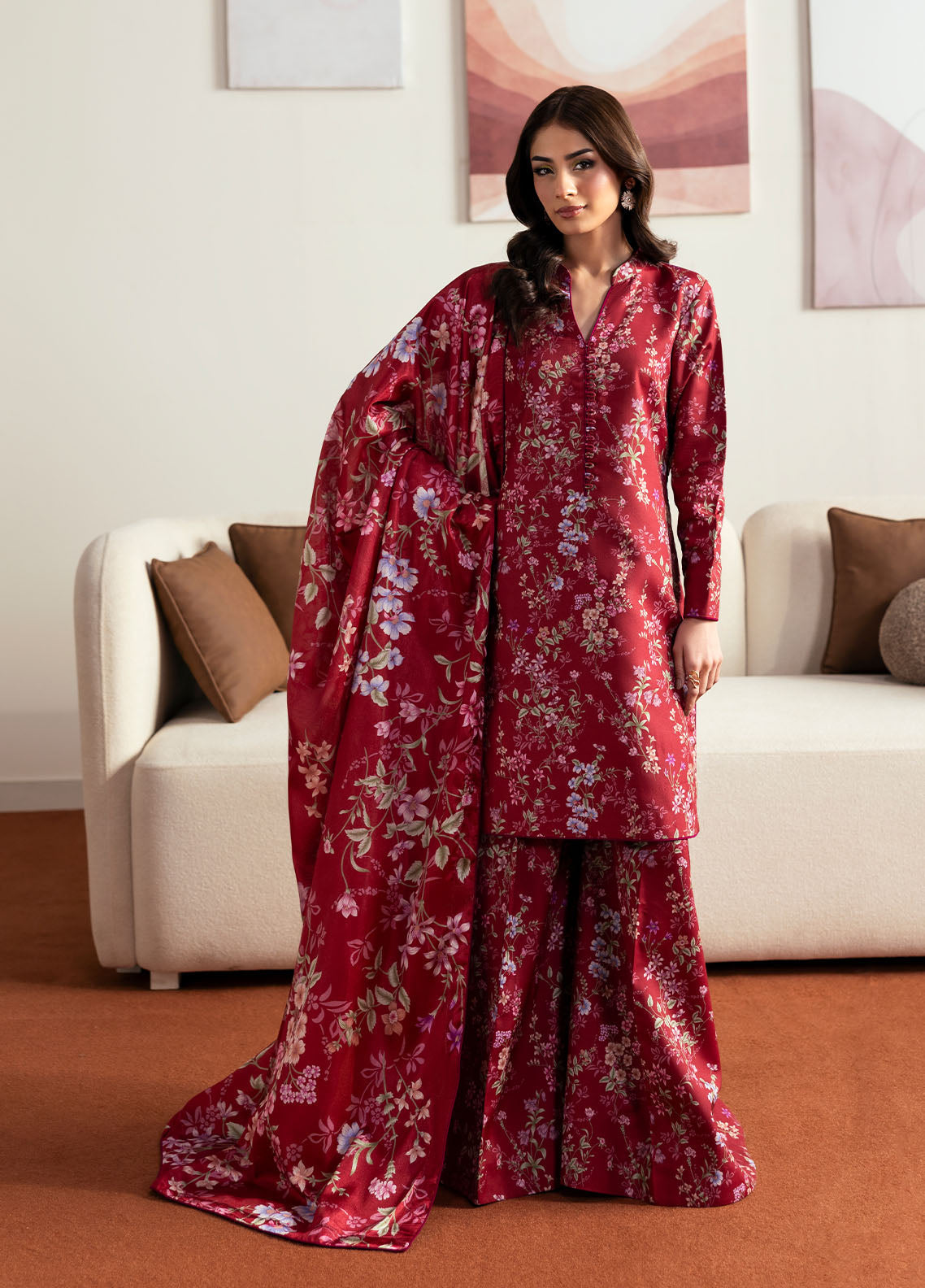 Model wearing deep red floral printed outfit from Gulaal Basics | Aster, perfect Pakistani luxury pret for Pakistani clothes online in UK.