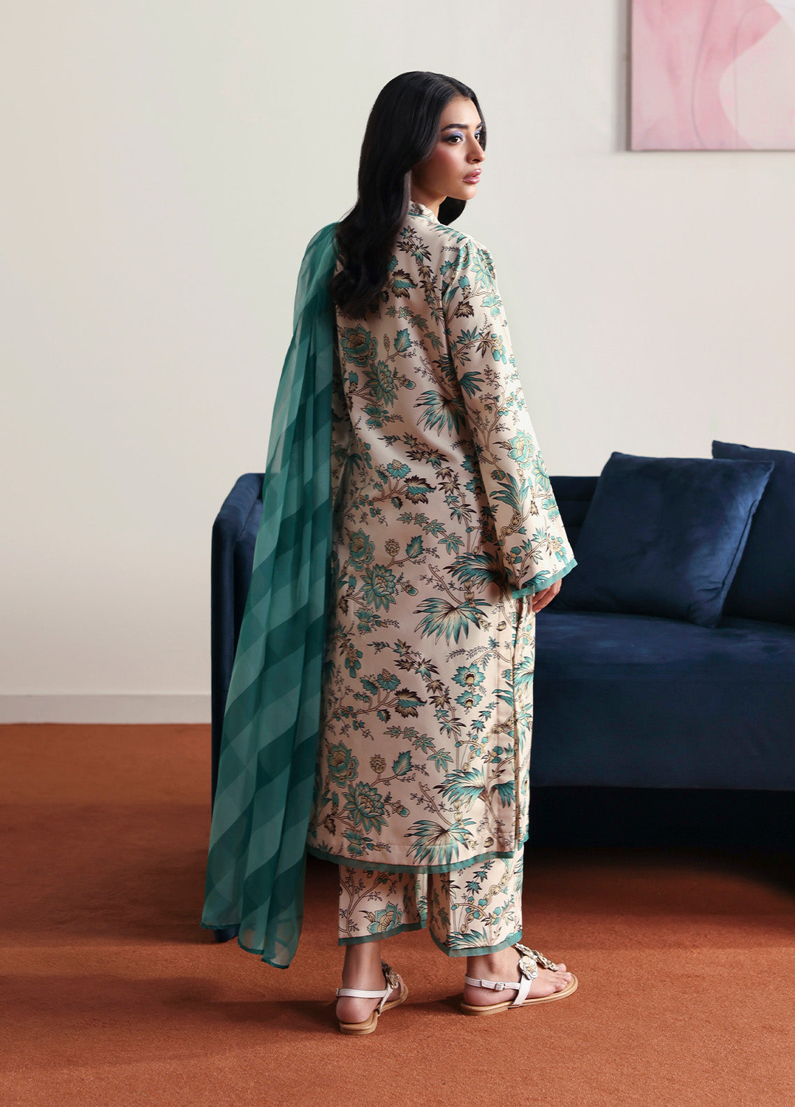 Model wearing meadowe from Gulaal in a beige printed co-ord set with teal floral design and matching dupatta, ideal for Pakistani luxury pret in the UK.