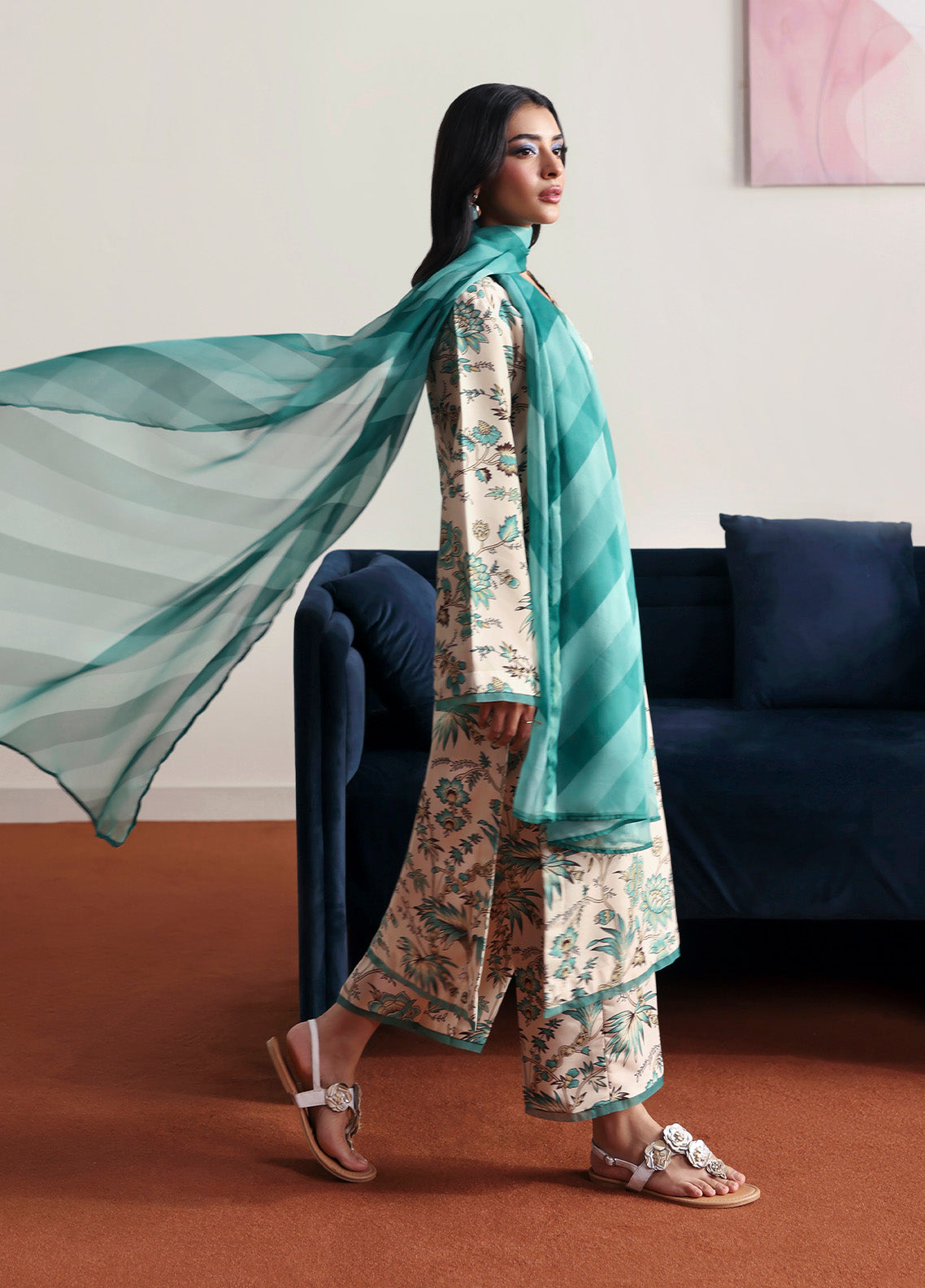 Model wearing meadowe from Gulaal in a beige printed co-ord set with teal floral design and matching dupatta, ideal for Pakistani luxury pret in the UK.